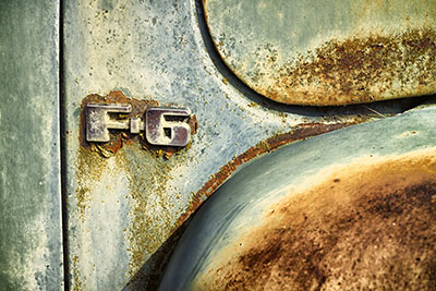 Closeup of a rusty Ford F6 pickup truck